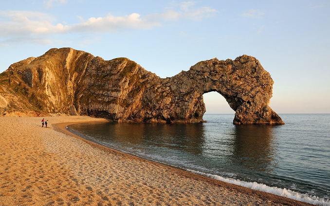 Durdle Door Dorset Sunset by Saffron Blaze on Wikimedia. https://creativecommons.org/licenses/by-sa/3.0/deed.en